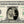 dollar bill from You're on the Money with a picture of a young woman kissing a man on the cheek on it
